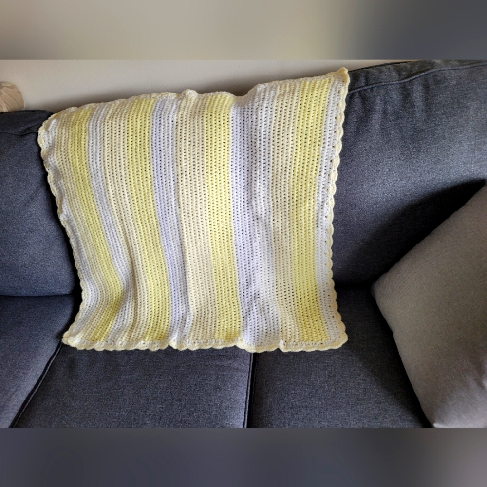 Yellow and white one of a kind croched blanket